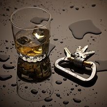 Alcohol and keys on a wet surface